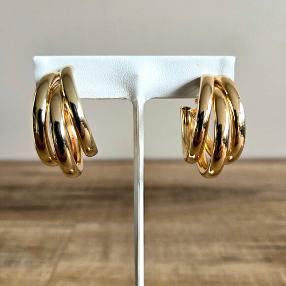 Gold tone large triple loops clip on earrings. - Picture 1 of 4